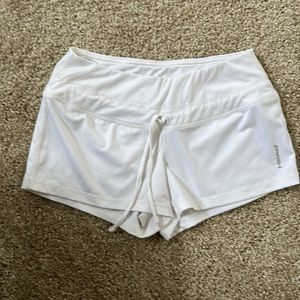White exercise shorts